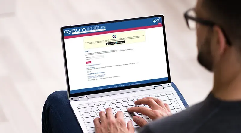 SystmOnline being used on a laptop